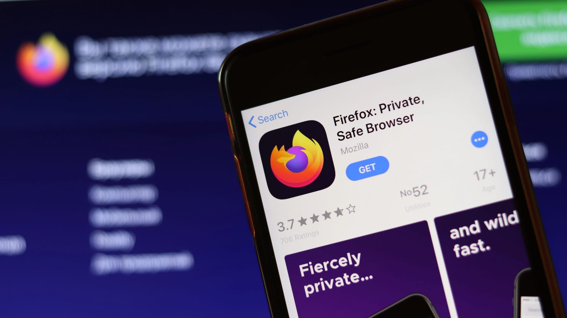 Phone with Firefox browser icon on screen close up with blur website on laptop. Los Angeles, California, USA - 30 November 2019, Illustrative Editorial Phone with Firefox browser icon on screen close up with blur website on laptop. Los Angeles, California, USA - 30 November 2019, Illustrative Editorial