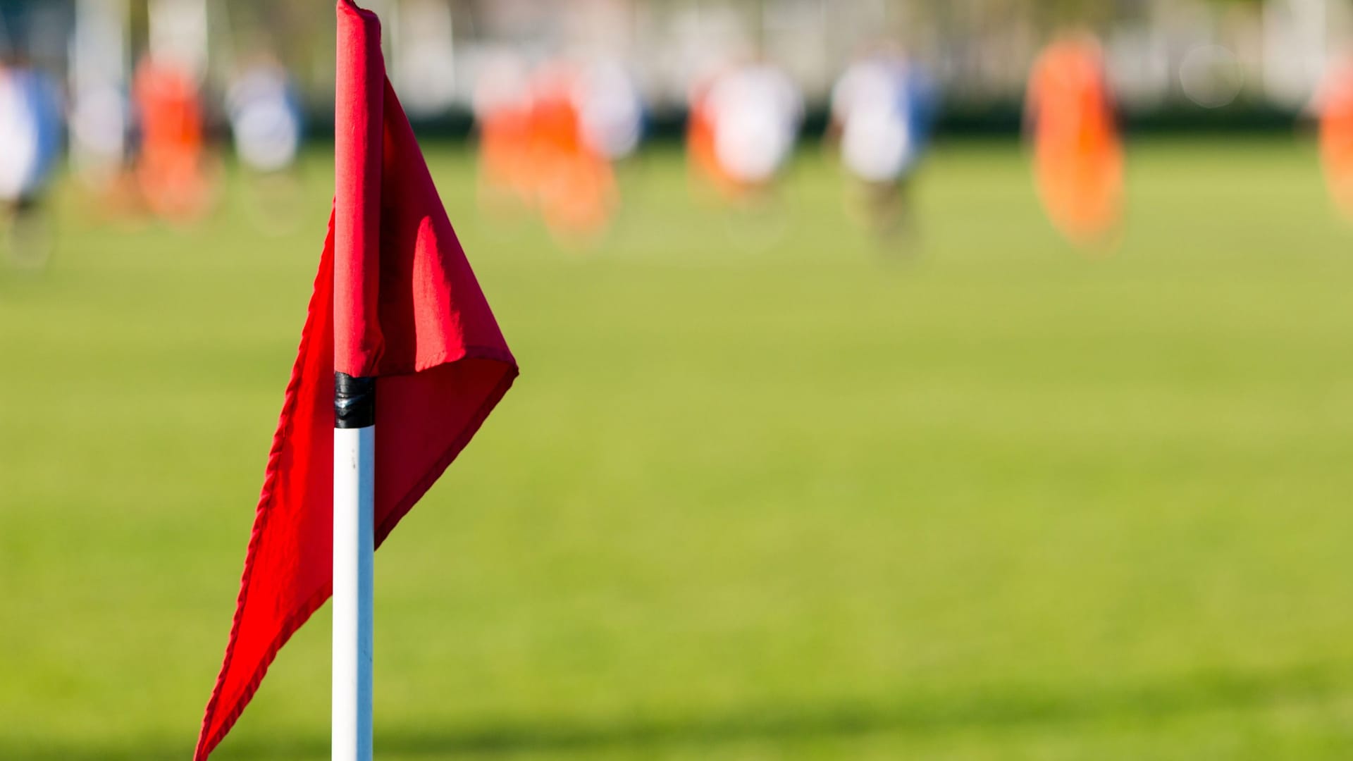 Blurred soccer players playing amateur soccer match Blurred soccer players playing amateur soccer match